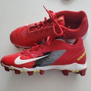 Nike Red Cleats with White Swoosh and Gray Accent